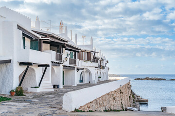 Iconic White Mediterranean Architecture Of Binibeca Vell Village Overlooking The Sea. Menorcan Coastal Town, Balearic Islands Travel, Whitewashed Houses