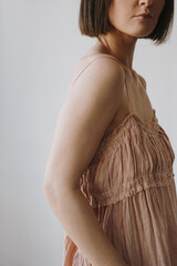 Portrait of a Woman in a Sleeveless Dress