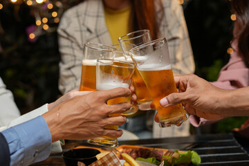 food and drink male friends are happy drinking beer and clinking glasses at a bar or pub.