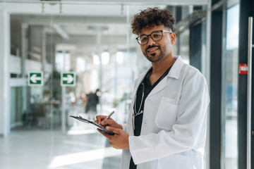 Professional worker. Doctor is indoors in the modern building