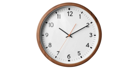 Antique wall clock with black numbers and a white face, isolated on white, marking the time