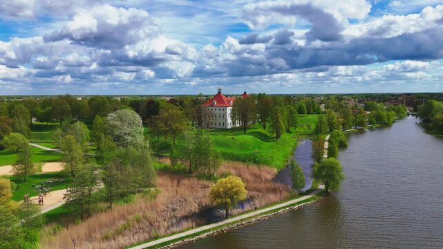 Aerial shot of Birzai Castle, on southern shore of Lake Sirvena in Lithuania