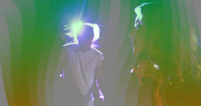 Female singer stepping into stage backlight and singing into microphone while building music energy