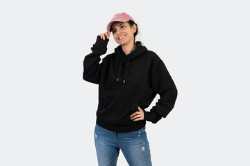 Mockup of a black hoodie on a woman with white background.