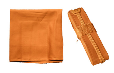 A traditional Buddhist monk’s robe and matching belt set, folded neatly on a white background,...