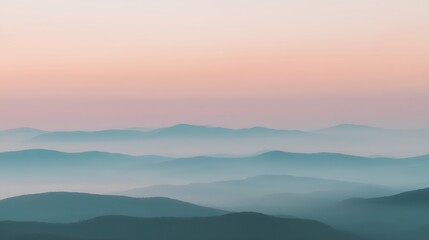 Fototapeta premium Mountains silhouette in soft misty sunrise light