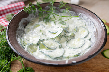 Grandmas delicious old fashioned cucumber salad with sour cream sauce,