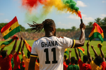 Ghanaian Fan with Dreadlocks Holding Colorful Flare

