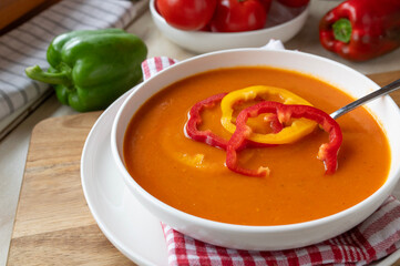 Delicious and healthy homemade cooked bell pepper soup on a plate