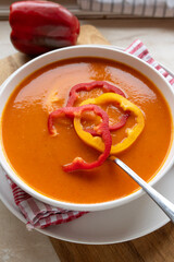 Delicious and healthy homemade cooked bell pepper soup on a plate
