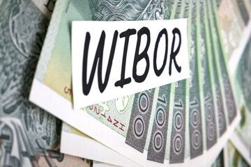 Inscription WIBOR next to polish money. WIBOR is Warsaw Interbank Offered Rate