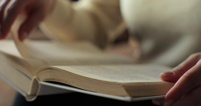 Female or student enjoying entertainment literature or educational textbook. Learning, studying, education, read books, stay home concept.