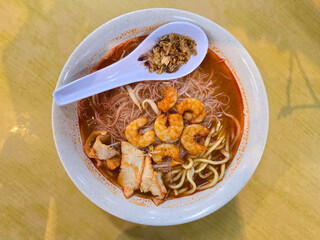 Penang Prawn Noodle with Sliced Pork and Fried Shallots