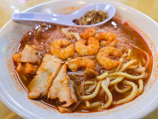 Penang Prawn Noodle with Sliced Pork and Fried Shallots