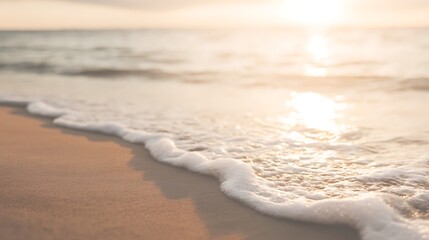 Gentle waves roll onto sandy shore