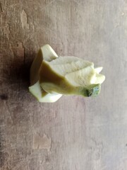 Fresh Green Mango Served on Wooden Table