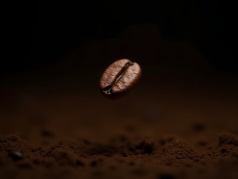Coffee bean floating in air. A coffee bean floats amidst swirling coffee grounds, showcasing rich texture and depth in a dark background.