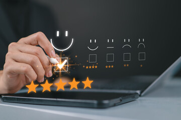 Customer review satisfaction feedback survey concept. User selects a five-star rating on a virtual...