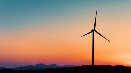 Obraz premium Wind turbine against sunset sky, symbolizing clean energy and sustainable future
