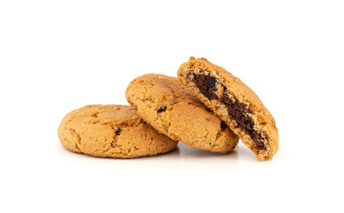 Chocolate cookies with chocolate filling isolated, brown round biscuits, broken sweet cocoa pastry