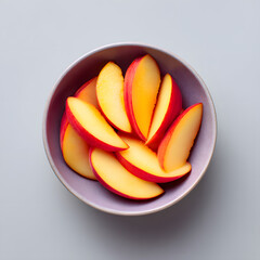 Top View Slices of Peach in a Bowl Isolated