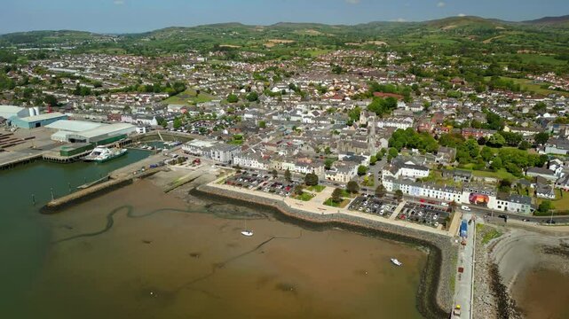 Slow, advancing aerial video of Warrenpoint, County Down, Northern Ireland, UK on a bright and sunny day. Filmed in 4K, 60FPS and with Rec709 color.