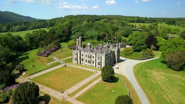 Reversing aerial video of Narrow Water Castle in Warrenpoint, County Down, Northern Ireland, UK on a bright and sunny day. Filmed in 4K, 60FPS and with Rec709 color.