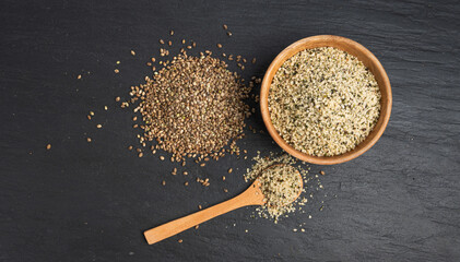 Shelled hemp seeds pile, peeled cannabis grains, marijuana kernels without peel