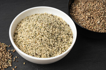 Shelled hemp seeds pile, peeled cannabis grains, marijuana kernels without peel