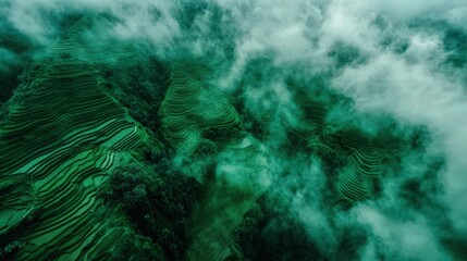 Drone view of rice terraces mirrored by cloud formations emerald green gradients