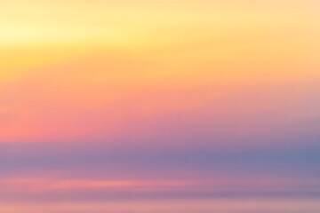 Fototapeta premium Soft Pastel Sky Gradient with Blended Colors of Yellow Peach Pink and Lavender