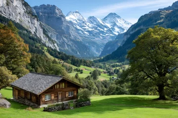 Handdoek met foto Wooden chalet overlooking picturesque valley in the swiss alps © Lubos Chlubny