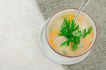 Hearty homemade Italian wedding soup with greens and meatballs