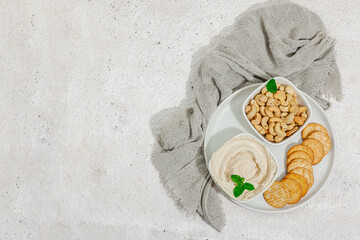 Homemade vegan cashew cheese. Raw healthy sauce in a bowl, lactose free food. Bio organic product