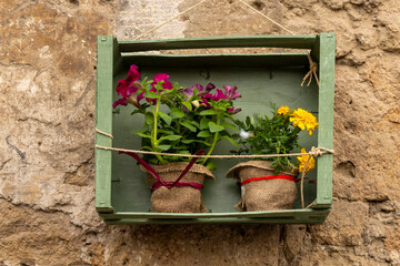 decoration with flowers in a wooden box	