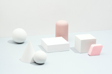 Minimal Packaging Mock-Up with Rectangular Boxes and Geometric Shapes