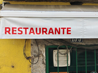 a restaurant sign in gastronomy
