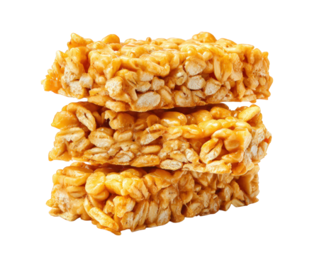 Crunchy cereal bars stacked together, showcasing delicious blend of oats and caramel. Perfect for quick snack or energy boost, these bars are both tasty and satisfying