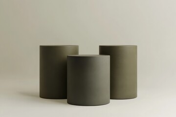 Modern 3D render of three minimalist pedestal cylinders, symbolizing product display and artistic showcase