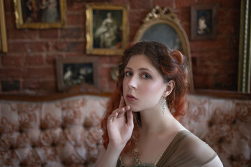 Sensual portrait of a girl in a vintage interior