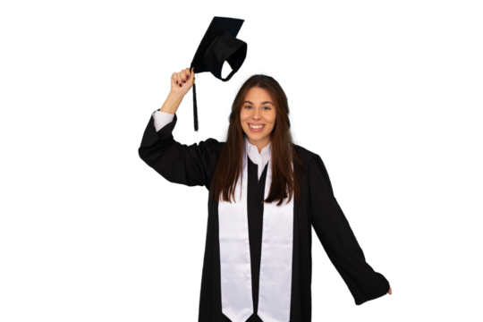 Jubilant graduate tossing graduation cap, marking academic milestone against clean backdrop