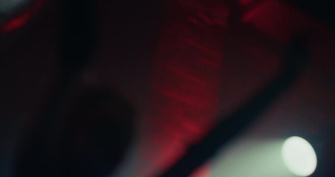 Blurry, Dreamlike Visuals From a Dance Floor with Colorful Lasers and Pulsing Light Patterns. Cinematic Abstract Surreal Glimpse Into the Heart of an Electronic Music Party