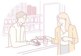 A customer making a payment with a card at a caf, showcasing modern payment methods