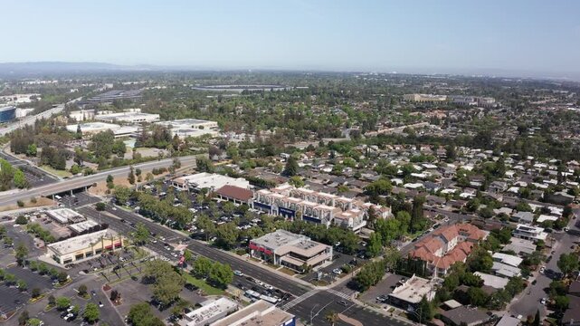 Aerial high descending shot of the tech-heavy Silicon Valley in South Bay Area, California, home of the artificial intelligence industry. 4K
