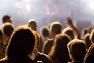 enthusiastic supporters during a musical performance