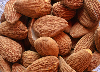 close up image of dry almonds, healthy eating theme