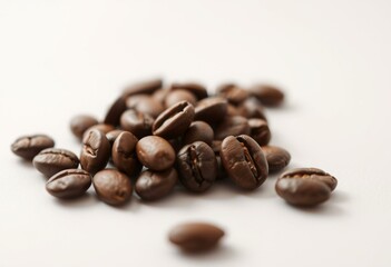 Naklejka premium A warm and inviting image of roasted coffee beans on a simple background