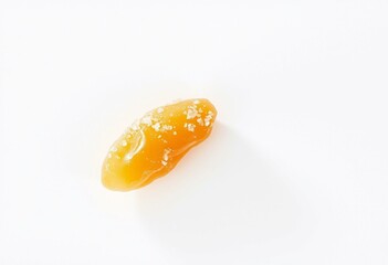 Small piece of candied ginger with sugar crystals
