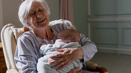 Loving elderly grandmother gently rocking sleeping infant grandson, nurturing bond radiating warmth and tenderness within cozy home interior - Powered by Adobe