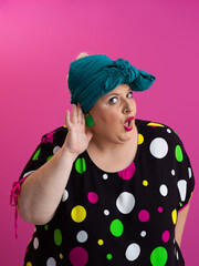 Skeptical woman posing with arms akimbo